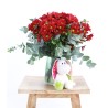 Bouquet of red daisies with teddy bear for birth