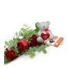 Bouquet of Roses with Teddy Bear and Chocolates at home. give flowers