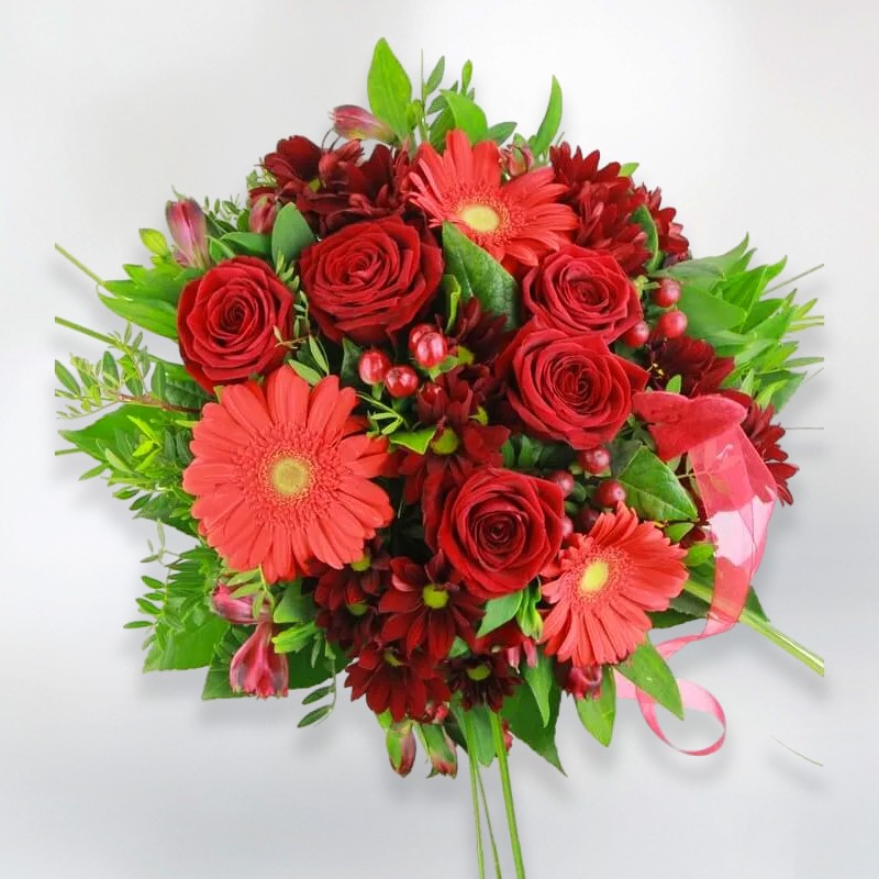 Bouquet of red flowers. Bouquet with red roses and assorted flowers.